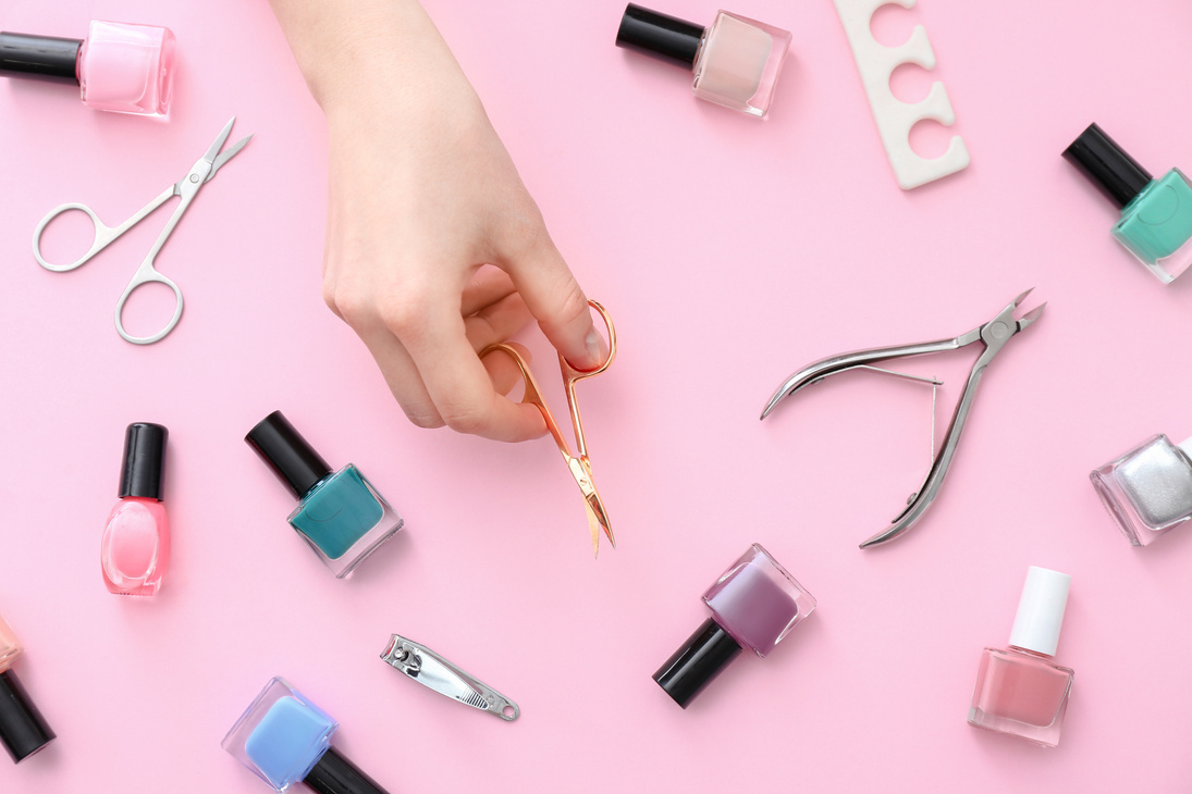 Supplies for Manicure on Color Background